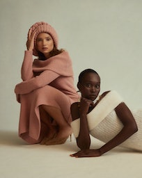 Two models wearing off the shoulder knitwear