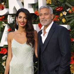 Amal Clooney and George Clooney attend the "Ticket To Paradise" World Premiere at Odeon Luxe Leicest...