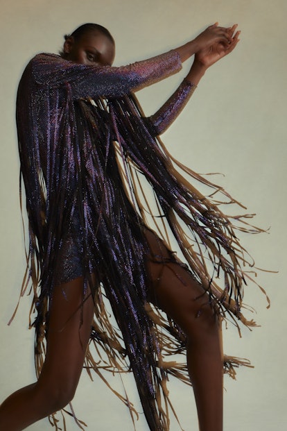 Model wearing fringe dress