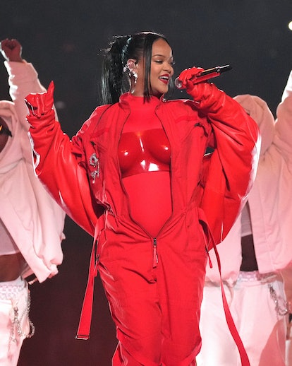 Rihanna red lips and braided ponytail at 2023 Super Bowl
