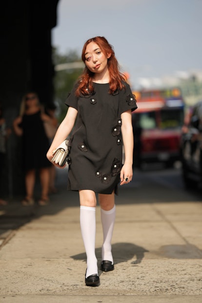 Copper hair is a New York Fashion Week Spring/Summer 2024 street style beauty trend.