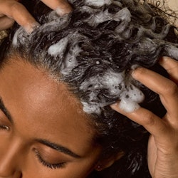 woman washing hair and scalp