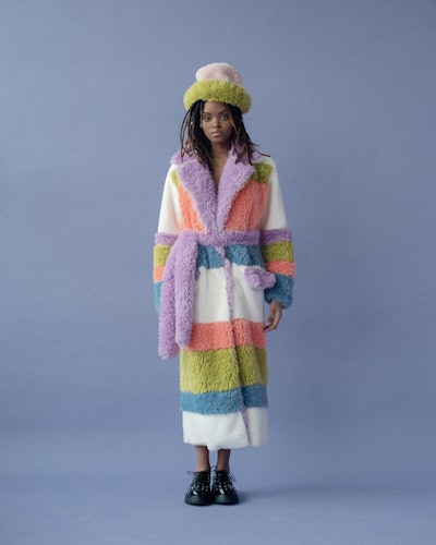 Model wears a maximalist winter outfit by Colin LoCascio.