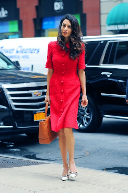Amal Clooney wearing red dress